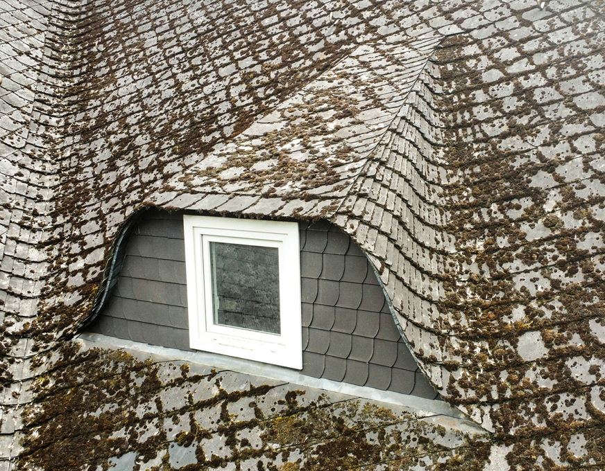   Die alte Dachdeckung bestand aus Faserzementplatten